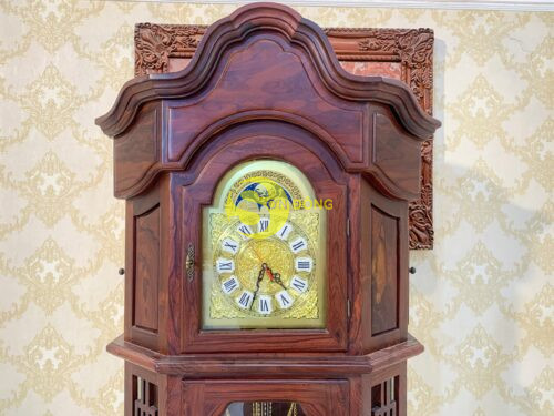 Dong ho thap hoang gia go Cam Lai 7