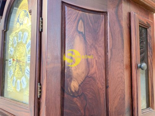 Dong ho thap hoang gia go Cam Lai 8